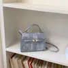 Bolso de hombro casual de color liso a la moda transfronterizo 2026 nuevo estilo elegante para commuters bolso de mano retro bolso cruzado pequeño cuadrado