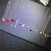 Moda Estilo Japonés y Coreano Anillo Doble de Animal en Oro Rosa de 18 Quilates Collar para Mujeres, Cadena Sencilla para Clavícula Colgante de Joyería de Acero de Titanio Venta al por Mayor