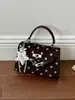 Bolso cuadrado pequeño de lunares para mujer, nuevo bolso cruzado versátil de moda estilo coreano para el verano 2026, bolso de hombro simple para el día a día