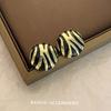 Pendientes de leopardo de estilo frío de lujo de alta gama, con temperamento de moda, para mujer, con personalidad, estilo dulce y fresco, diseño de nicho, al por mayor