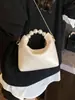 Bolsa de Mão Pérola com Design de Nicho da Moda para Mulheres, Nova Bolsa Transversal de Corrente de Alto Padrão, Bolsa Fresca Formato Bolinho