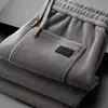 Pantalones de pana extra gruesos y elásticos para hombre para otoño e invierno, con forro de polar y un diseño casual de pierna recta