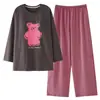 Nuevo conjunto de pijama de algodón puro para mujer con sujetador incorporado, caracterizado por mangas largas y pantalones largos, un diseño de dibujos animados y un estilo cómodo e informal que también se puede usar como ropa de estar en casa.