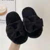 Pantuflas Infantiles 2026 Otoño/Invierno Nuevas Pantuflas de Algodón con Moño y Punta Abierta para Niñas Ropa de Casa Pantuflas Peludas de Invierno para Niñas Jóvenes Modernas