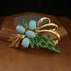 Estilo corte francés turquesa exquisito racimo de uvas corsage chapado en oro real diseño broche de cristal accesorios