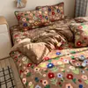 Juego de ropa de cama de cuatro piezas de terciopelo de leche para invierno, acolchado engrosado y forrado de felpa, sábana doble y funda de edredón