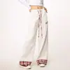Calça de moletom com estampa de Dachshund, retalhos xadrez estilo americano e barras dobradas, calça casual solta de perna larga até o chão para mulheres