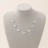 Joyería transfronteriza europea y americana aleación collar con colgante de mariposa hueca tridimensional para mujer moda versátil personalidad nuevo collar