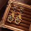 Pendientes de Diseño Retro de Nicho Estilo Medieval, Pendientes de Ojo de Tigre con Lazo, Pendientes de Cristal Azul de Alta Gama para Mujer