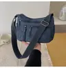 Bolso cuadrado pequeño informal de moda estilo coreano, con múltiples bolsillos y gran capacidad, versátil para viajes y compras, se puede llevar al hombro o cruzado.