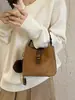 Bolso de mano nuevo de comercio exterior transfronterizo, bolso tipo cubo moderno y elegante para mujer, con un diseño único, adecuado para el trabajo diario, y se puede llevar como bolso de hombro o bolso cruzado