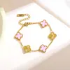 Pulsera de acero de titanio chapada en vacío 18k, diseño de nicho, trébol de cuatro hojas, floral, pulsera de moda de alta gama