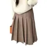 Chic coreano nueva colección de principios de otoño: Falda plisada de piel sintética versátil estilo francés, de cintura alta, longitud media, para mujer