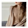 2025 Otoño e Invierno Nuevo Estilo Emocionante Elegante Femenino Hongo Medio Cuello Tortuga Manga Linterna Ropa de Punto Base para Mujer