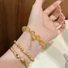 Nuevo brazalete de calabaza con borla estilo chino y cristal amarillo para mujer, nuevo diseño de nicho, exquisito y versátil, brazalete de imitación de cristal amarillo de regalo