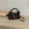 Bolso de mujer diseño de moda nicho 2026 versátil plisado bandolera bolso de mano para ir al trabajo retro nuevo estilo diagonal un solo hombro nube