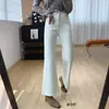 Jeans acampanados de cintura alta, elásticos en cuatro direcciones, corte reductor y un ligero acampanado, perfectos para otoño, diseñados para acentuar las caderas