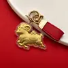 Amuleto de la Suerte del Año de la Oveja Llavero de Ovejita Bolso Dorado Cadena para Teléfono Colgante Souvenir Exquisito de Negocios Regalo