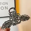 Grampo de Cabelo Grande com Design Vazado de Flor de Rosa para Prender na Parte de Trás da Cabeça Estilo Frio Estilo Fada Acessórios de Cabelo de Metal