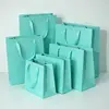 Bolsa de regalo estilo Ins bolsa de regalo de lujo ligero bolsa de embalaje bolsa de papel bolsa tote bolsa de tienda de ropa en stock bolsa de regalo de cumpleaños