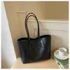Bolso tote popular de gran capacidad transfronterizo para mujer, nuevo bolso casual simple para el hombro 2026, bolso de hombro versátil de moda para el trabajo