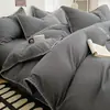 Juego de Cuatro Piezas de Algodón Lavado con Borde de Concha Clase A Sencillo de Color Sólido Juego de Cama de Algodón de Cuatro Piezas 100% Algodón 2025 Sábana Bajera Funda Nórdica
