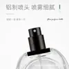 Botella de Perfume de Vidrio Plano Ovalada Transparente con Atomizador Negra Tapa de Aluminio Anodizado Botella de Recarga de Perfume