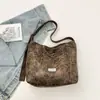 Bolsa Tote Estampa de Leopardo Feminina 2026 Nova Outono Leve Luxo Toque de Alto Padrão Bolsa de Ombro Único Grande Capacidade Bolsa Saco Transversal