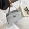 Bolso de mano con cierre de broche de temperamento estilo extranjero para mujer 2026 otoño nuevo bolso de mano con patrón de cocodrilo bolso de hombro de moda versátil para el trabajo bolso pequeño