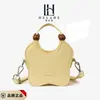 Mini Bolsa de Mão Cesta de Legumes Infantil 2026 Nova Moda Bolsa de Ombro Versátil Crossbody Balde Porta-Moedas Bolsas