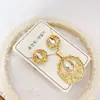 Nuevo especial transfronterizo explosión de tendencia europea y americana titanio acero alta calidad color collar pendientes traje femenino joyería de concha real