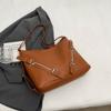 Bolso de hombro femenino de gran capacidad con textura versátil para uso diario, bolso de mano para la axila, bolso de mano para principios de primavera 2024.