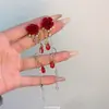 Pendientes de Perlas con Lazo Rojo para Otoño e Invierno Pendientes de Alta Gama para Mujer 2025 Nuevo Estilo Chino Pendientes Rojos