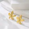 Estilo Ins europeo y americano diseño de nicho pendientes de pétalo tridimensional retro temperamento venta al por mayor pendientes de oro de 18k regalo de Año Nuevo