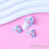 Linda mini cara de muñeca de dibujos animados joyería para uñas tridimensional castor oso perro resina pequeños accesorios accesorios para uñas venta al por mayor