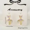 Brincos Femininos Geométricos Banhados a Cobre com Gotejamento de Óleo para Uso Transfronteiriço Fivela de Orelha Padrão Flecha do Amor de Cupido Fivela de Orelha da Moda