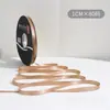 Lazo de regalo de color sólido de 1 cm flor decorativa para envolver material para ramos de cinta de satén venta al por mayor