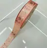 Cinta de Papel para Regalo Popular Transfronteriza de 2.5 cm con Estampado Caliente Accesorios para Empaque de Cajas de Regalo Cinta Lazo DIY Soporte de Barra Material