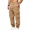 Pantalones deportivos de punto holgados para hombre, versátiles, de talla grande, para exteriores, casual, deportivos, con múltiples bolsillos, ropa de trabajo, europeos y americanos, transfronterizos de Amazon