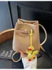 Moda de Tendencia Nueva Primavera y Verano 2025 Bolso Cubo Nicho Patrón Granulado Color de Contraste Bolso de Hombro Bolso Cruzado Súper Popular