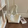 Bolsa de palha grande e resistente para mulheres, nova bolsa de mão texturizada de nicho outono 2026, bolsa de ombro casual para o dia a dia