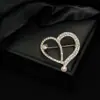 Broche vintage incrustado de diamantes al por mayor temperamento versátil lazo aleación ramillete accesorios de ropa anti-luz para mujer pin joyería