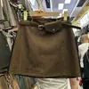 Saia Midi Curta Imitação de Camurça Estilo Retrô Americano para Mulheres Plus Size, Cobertura do Quadril, Nova para Primavera e Outono, Cintura Alta, Corte Evasê, Cor Marrom