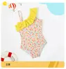 Niños y niñas hombro inclinado conjoined secado rápido estilo ins lindo bebé niña pequeño floral aguas termales natación fabricantes al por mayor