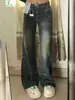Pantalones de mezclilla estilo patchwork, elegantes y únicos, para mujer, nueva colección primavera/otoño 2026, diseñados para figuras tipo pera, corte holgado, ligeramente acampanados, de pierna ancha