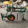 Máquina mulchadora de tractor guiada a mano micro-rotocultivador máquina colocadora de film máquina cubridora de film máquina cubridora de film de suelo máquina colocadora y cubridora de film de suelo de cuatro ruedas