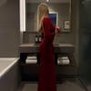 Moda Europea y Americana Transfronteriza Cuello Redondo Manga Larga Espalda Descubierta Grande Lazo en la Cintura Elegante Delgado Vestido Largo de Alfombra Roja Vestido de Moda