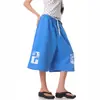Shorts Casuais Esportivos de Cinco Pontos com Estampa de Letras Desgastadas Estilo Retrô Americano para Homens e Mulheres Cintura Elástica Larga Solta Tendência