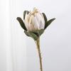 Uma variedade de flores artificiais decorativas de Primavera, flores imperiais, flores overlord, decoração de interiores, layout de cena de casamento, flores de simulação