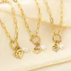 Cadena de clips de papel creativa personalizada multiestilo corazón hueco incrustado de diamantes collar de acero de titanio madre levantando alto día de la madre